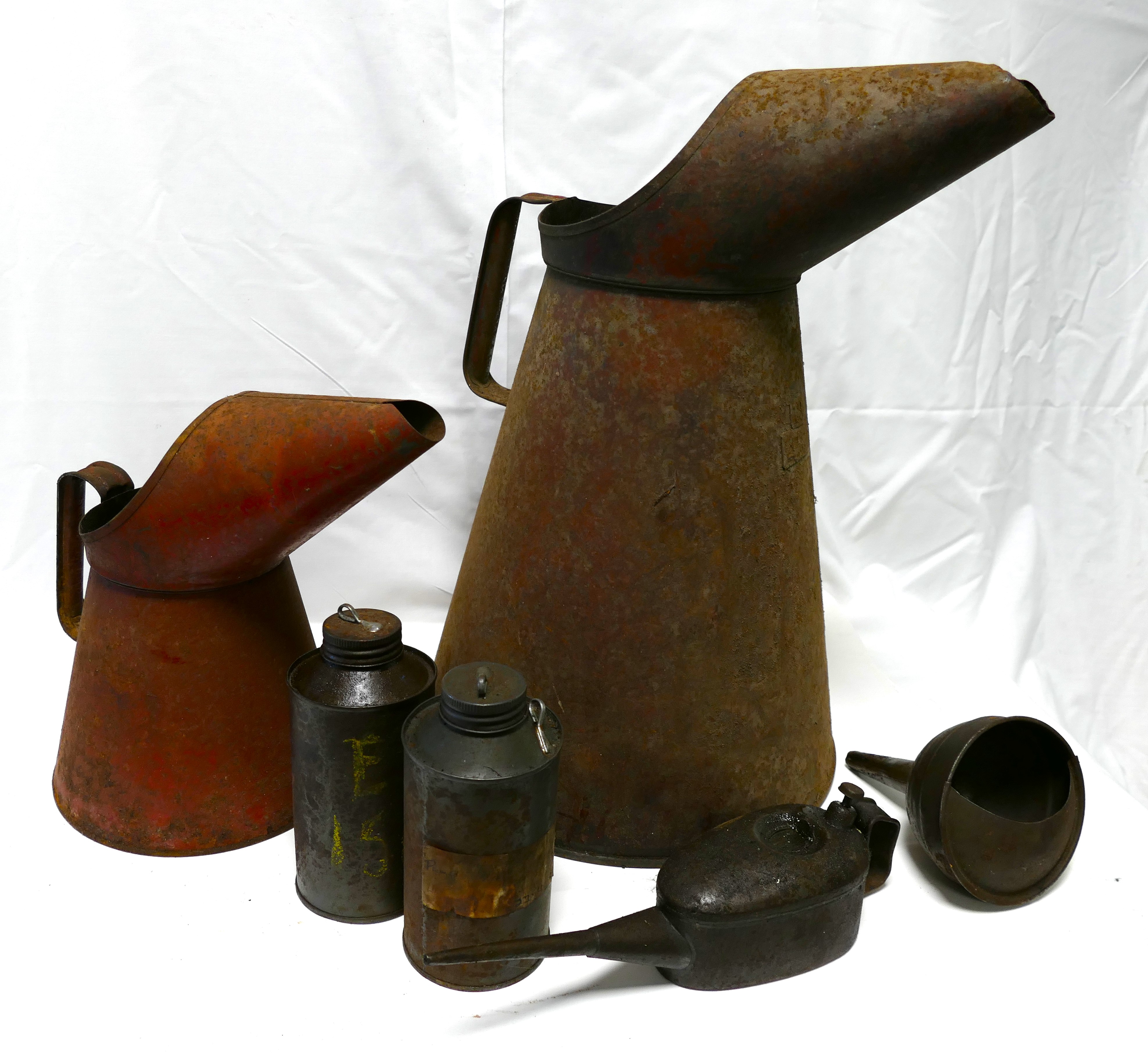 Two oil jug pourers (44 cm 10 litre and