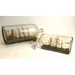 Two model ships in bottles. Largest bot