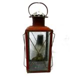 Falks red paraffin lantern, height 47 cm