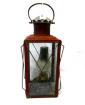 Falks red paraffin lantern, height 47 cm