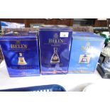 Three boxed Bells Extra Special Old Scotch Whisky decanters,
