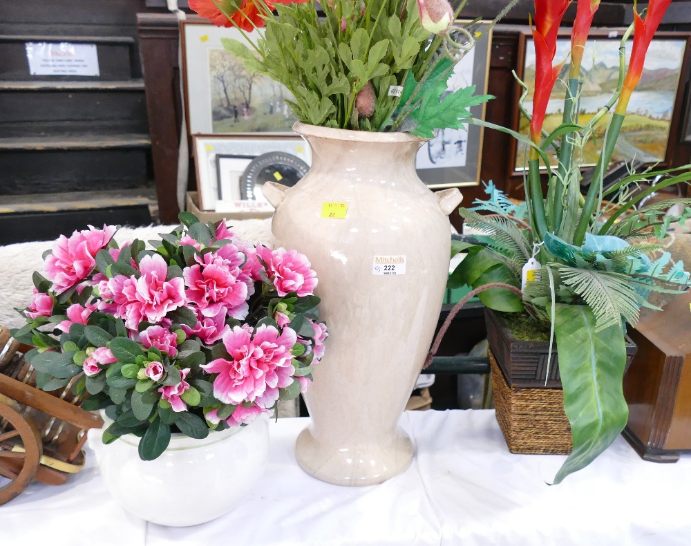 Three vases of artificial flowers