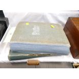 Two vintage postcard albums with contents,