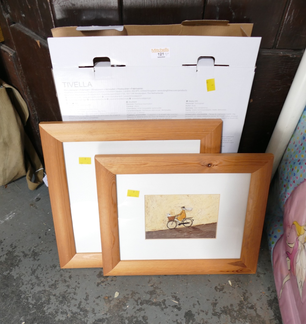 Boxed toilet seat and two prints