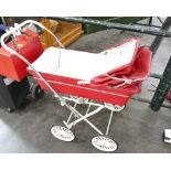 Red vintage child's pram