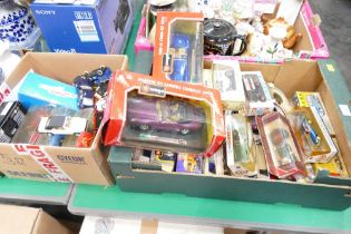 Two boxes of diecast vehicles, Burago Porsche 911 and Burago Ford Cobra 427, Models of Yesteryear,