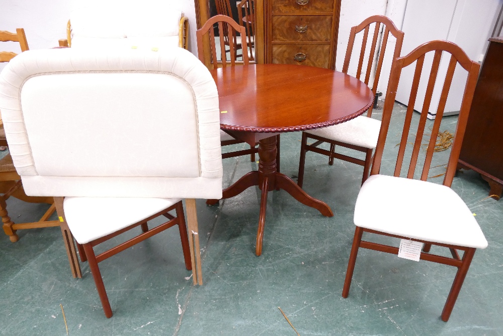 Modern veneered circular table and chairs