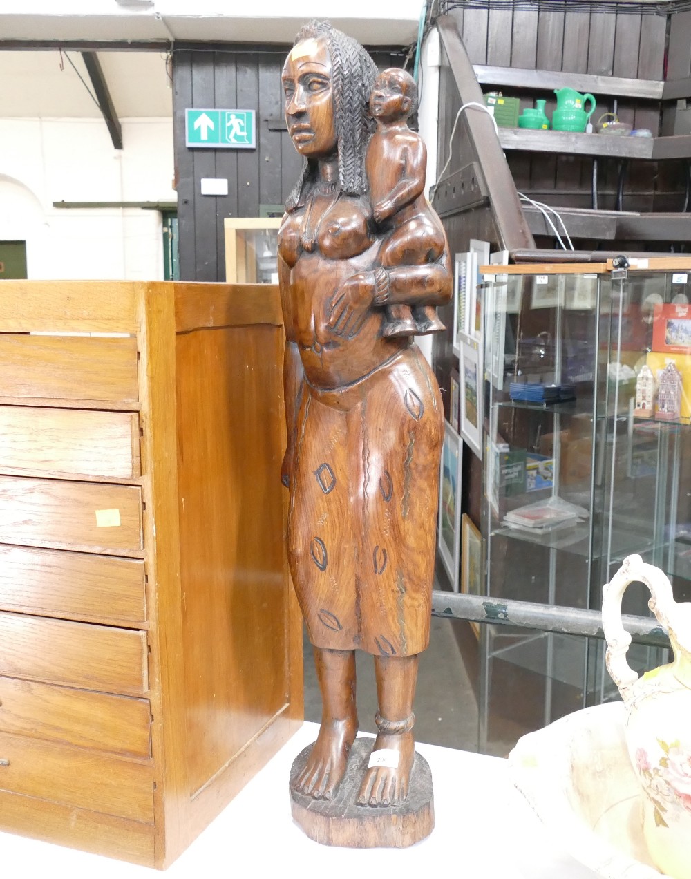 Wooden carving, woman and child,