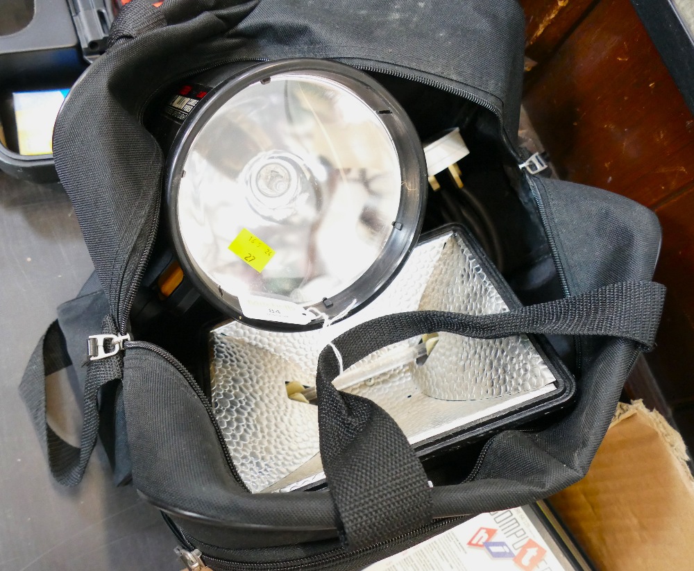 Bag of Omega Model CL500 half million candle power cordless spotlight and Thorn EMI Hayline 5