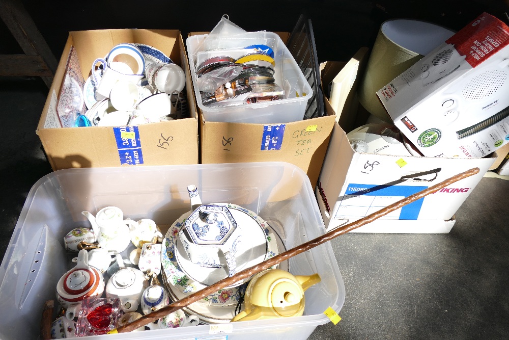 Four boxes of ceramics, ornaments, heaters, lamps,