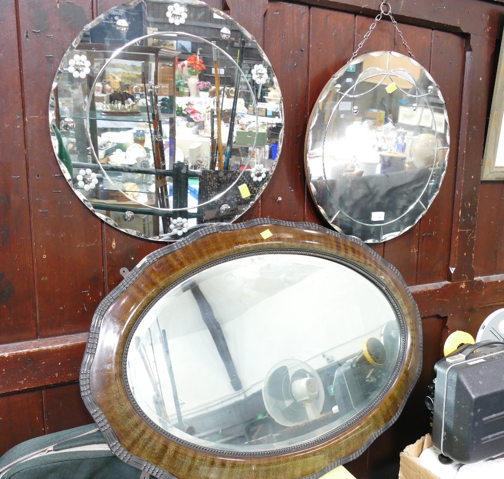 Two frameless mirrors, 46 cm diameter,