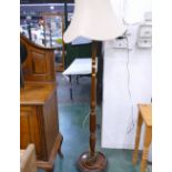 Standard lamp with cream shade