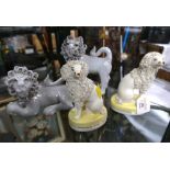 Pair of small Staffordshire dogs on yellow bases, 14 cm high,