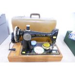 Singer hand operated sewing machine in case