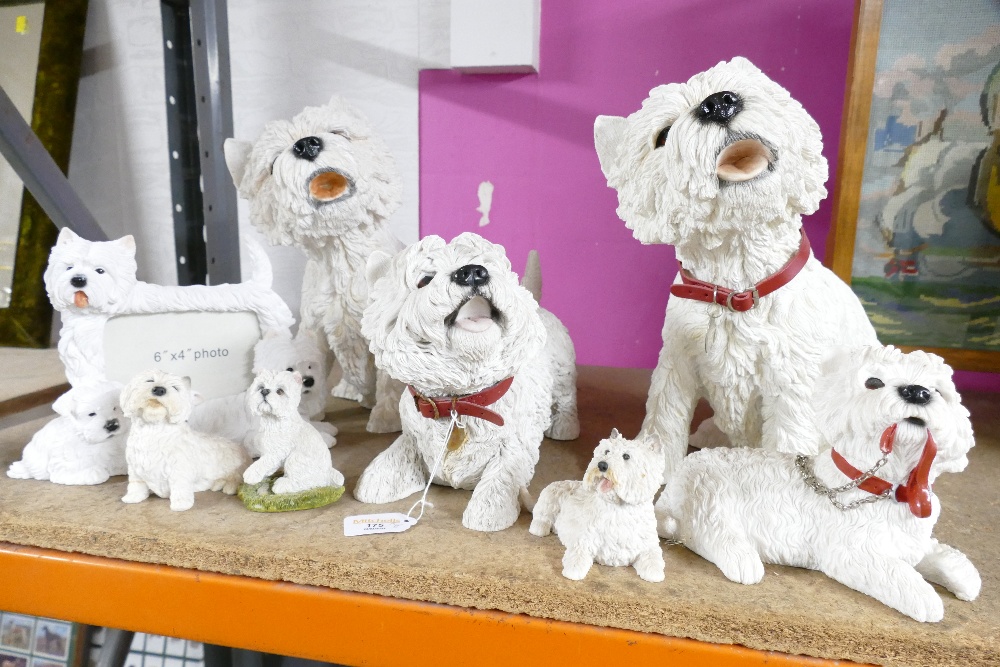 Eight West Highland Terrier dog ornaments, largest 33 cm high,