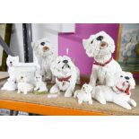 Eight West Highland Terrier dog ornaments, largest 33 cm high,