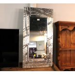 Hand beaten metal wall mirror by Maria Santos Functional Pewter Art,