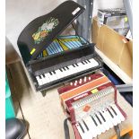 Small wooden painted child's or dolls piano and Bontempi child's accordion