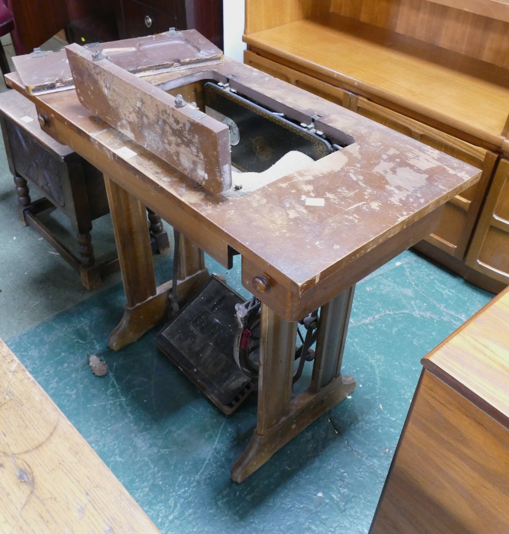 Vintage Singer sewing machine on treadle base