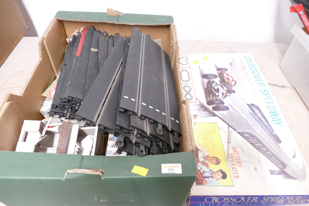 Box of Scalextric racing track,