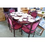 Table and six deep button backed red velvet type chairs