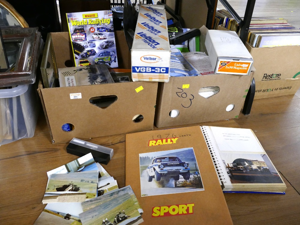 Two boxes of motorcar rallying memorabilia, Velbon tripod,