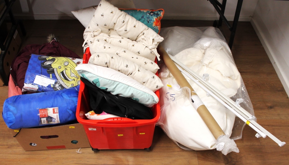 Three boxes of cushions, child's duvet, sleeping bags, coats,