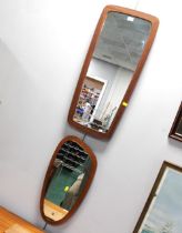 Two shaped mid century wall mirrors,