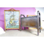 Embroidered galleon firescreen and wooden magazine rack