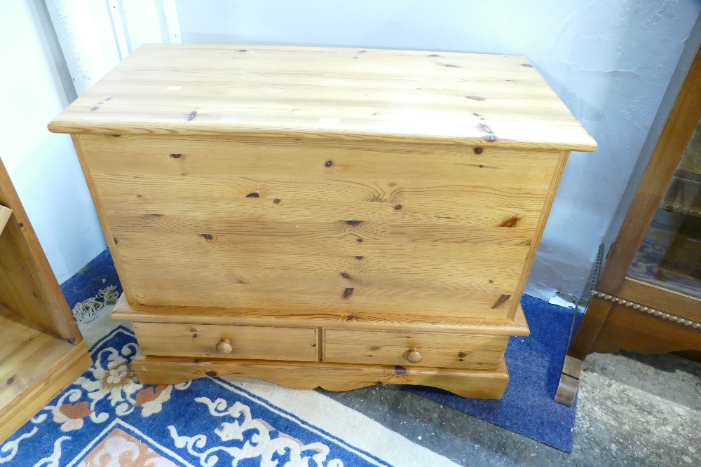 Pine bedding chest with two drawers to base