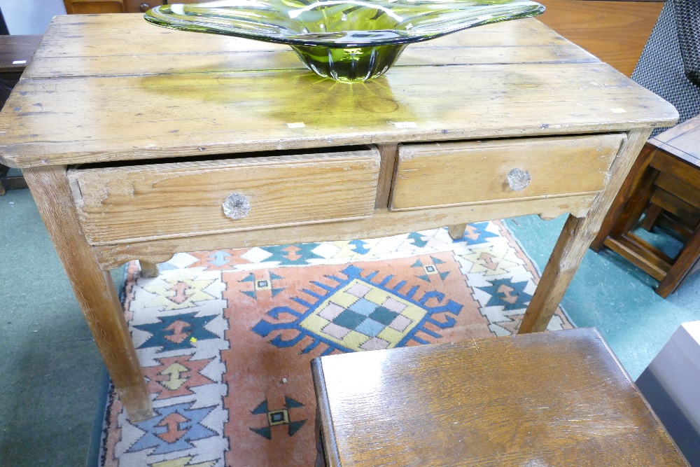 Victorian pine two drawer side table with glass handles, height 76 cm,