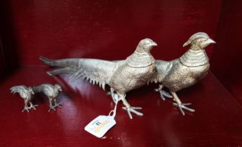 Two pairs of metal pheasant figures,