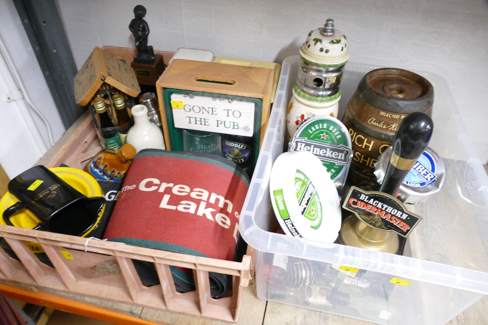 Two boxes of brewerania, including beer pumps, ashtrays, drip trays, whisky jugs, ice buckets,