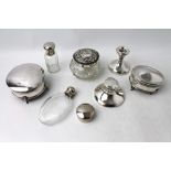 Hallmarked silver and white metal dressing table accessories including powder boxes,