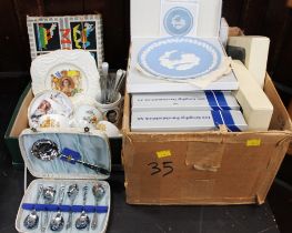 Two boxes of boxed collectors' plates, commemorative mugs and plates,