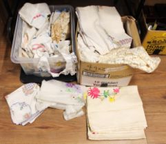 Two boxes of fabric including embroidered linen