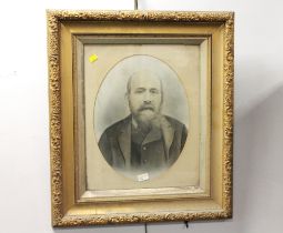 Antique portrait of a gentleman in gold coloured frame,