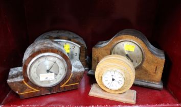 Four wooden mantel clocks