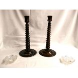 Pair of twisted stem candlesticks made from timber taken from HMS Britannia, 31cm high.