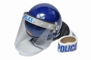 Police Memorabilia comprising Authentic issue size two British Police Riot Helmet and tape. Very