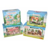 Sylvanian Families comprising four boxed playsets to include Bakery, Primrose Nursery, Caravan and