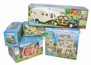 Sylvanian Families comprising five boxed playsets to include Caravan and Family Car, St Johns