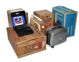 A group of vintage audio - visual equipment including projectors, camera and other items as shown.