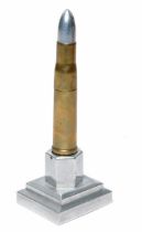 Trench Art comprising a Bullet / Shell Lighter, mounted on to base.