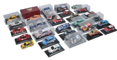 A collection of 30 diecast 1/43 and 1/32 Rally / Racing Cars from various makers as shown, some with