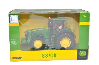 Britains 1/32 Farm Model issue comprising no. 42999 John Deere 8370R Tractor. Excellent and