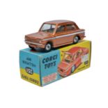 Corgi No. 251 Hillman Imp. Bronze / White trim with light tan interior. Spub Hubs. Generally