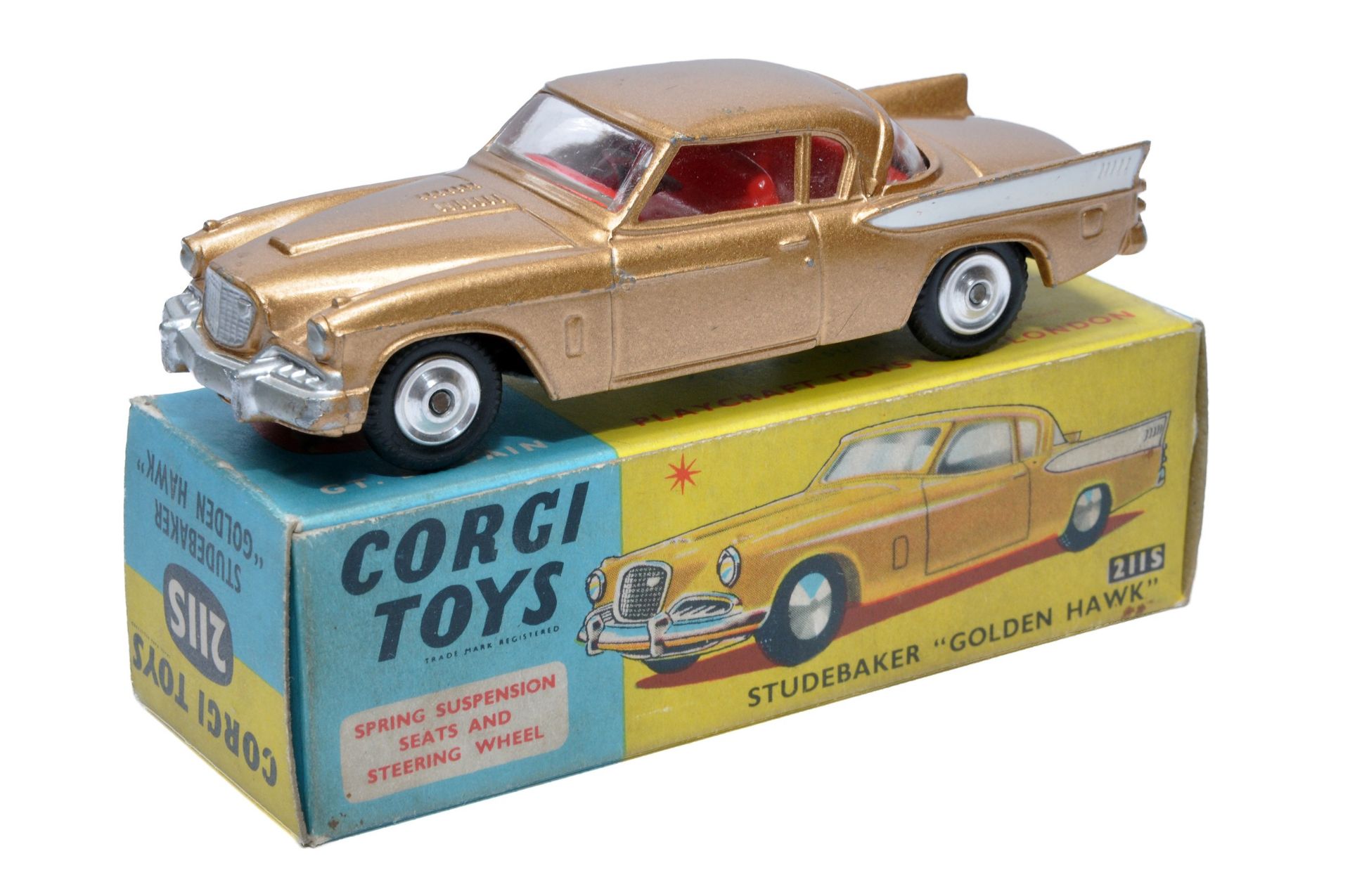 Corgi No. 211S Studebaker Golden Hawk. Gold / white flash with red interior. Spun hubs. Generally