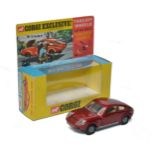 Corgi No. 341 Mini Marcos GT850. Metallic maroon with white interior. Cast hubs. Displays very good,