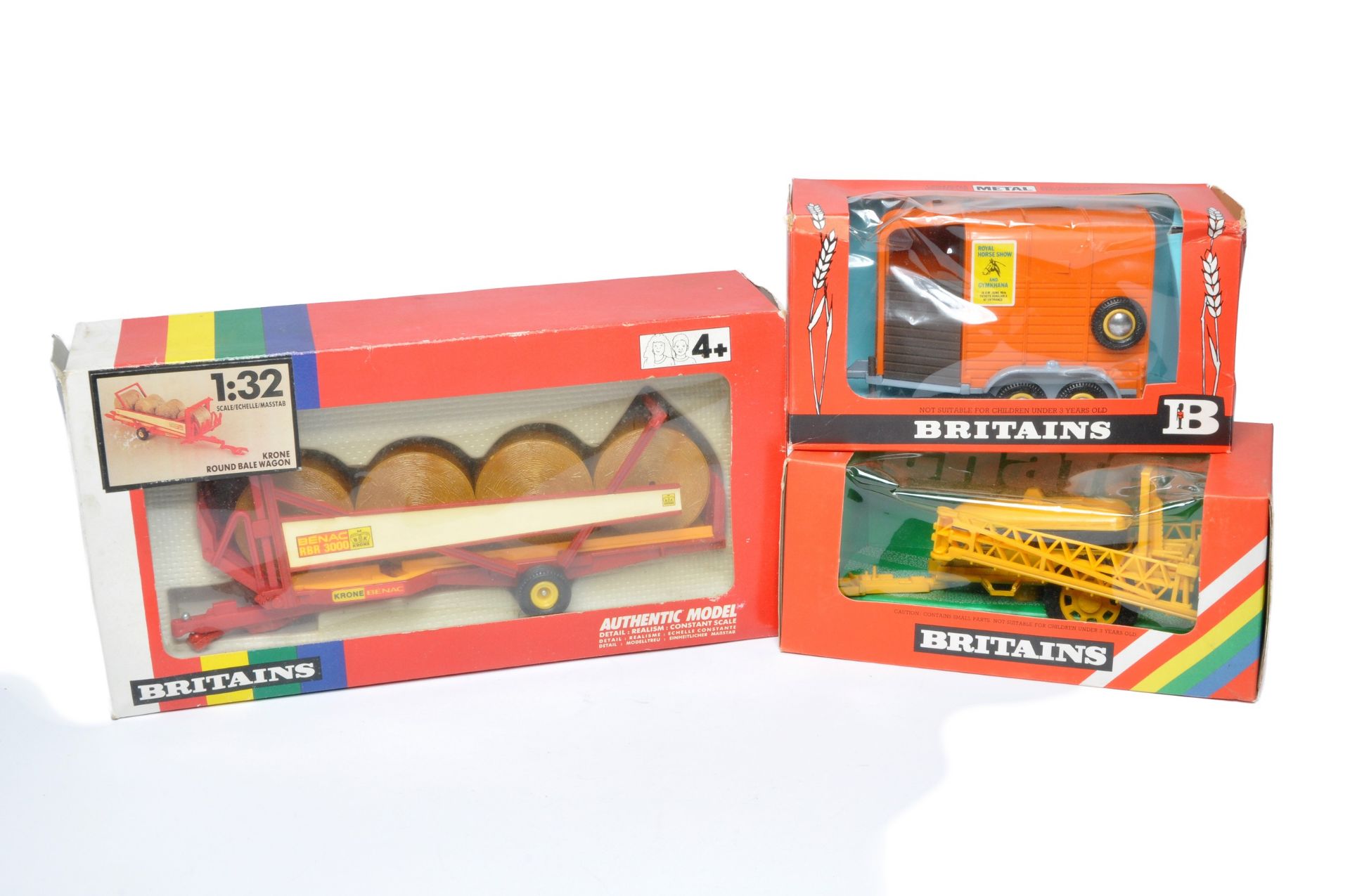 Britains Farm group of three 1/32 implement issues. Includes Chafer Sprayer, Horsebox and Bale